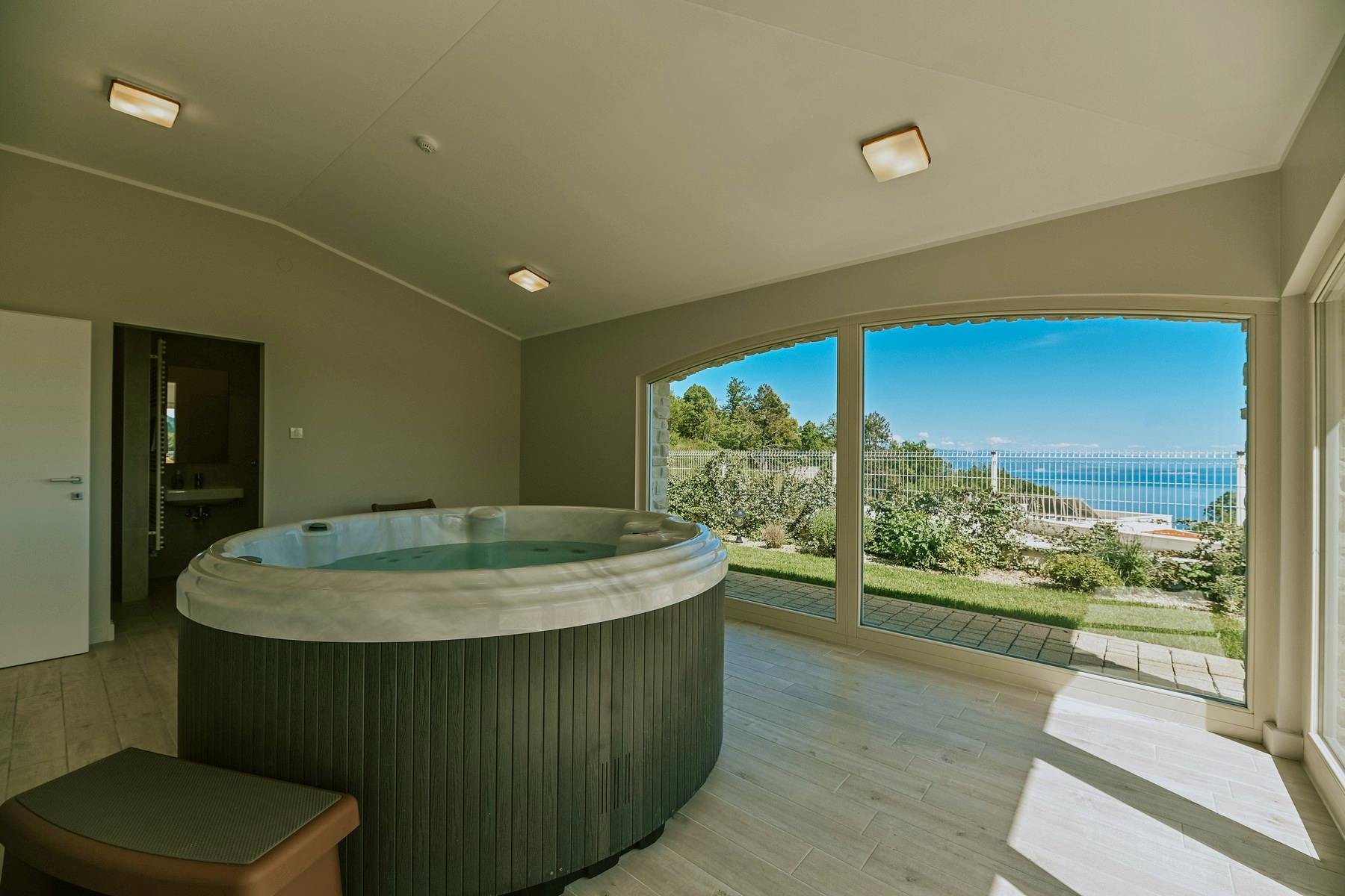 Hot tub boasting sea view