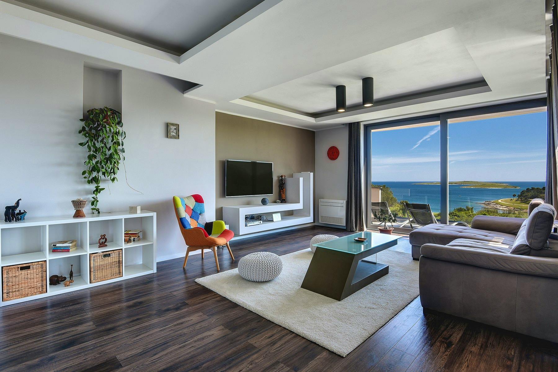 Open space living area with open sea viwe