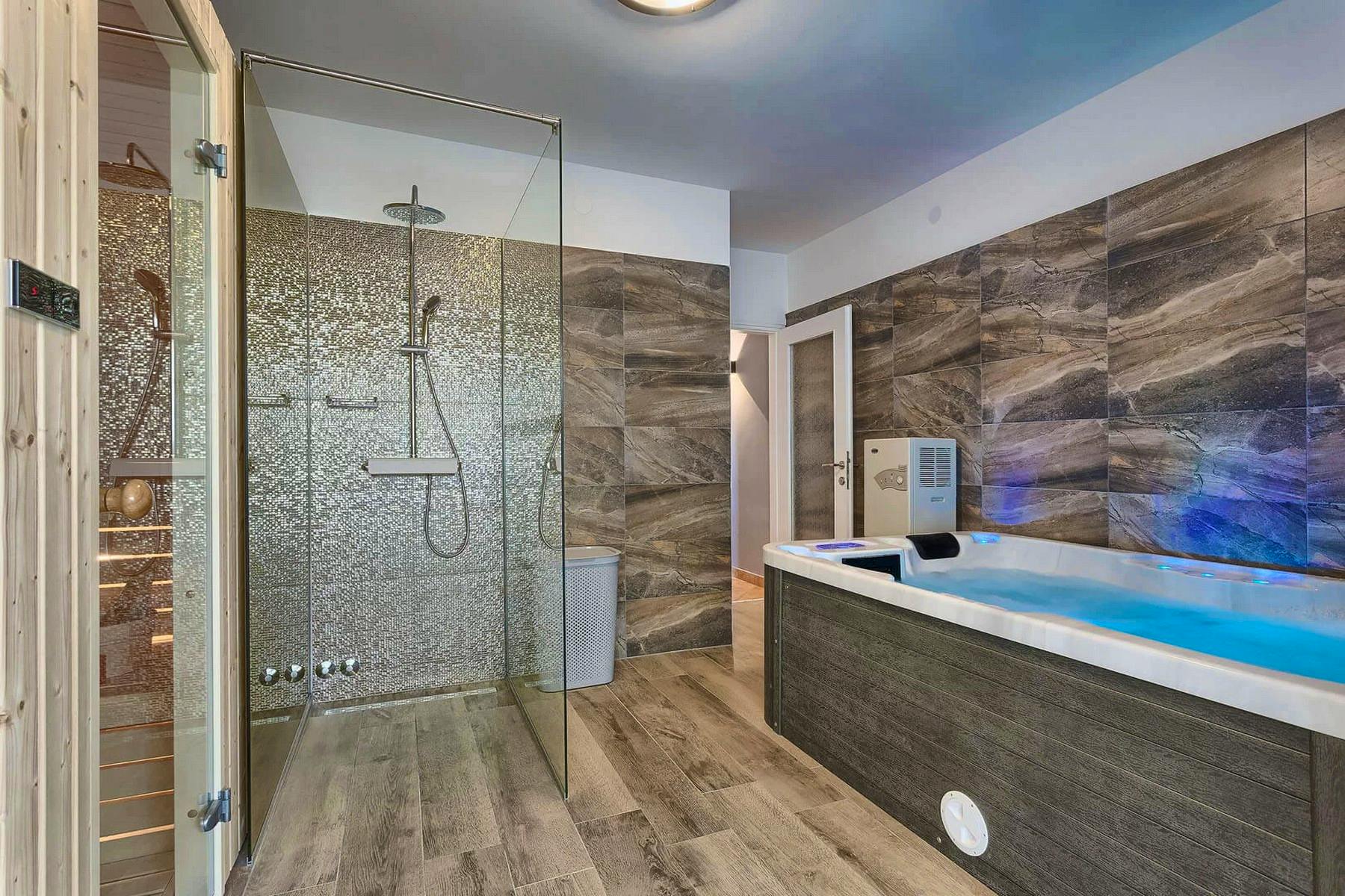 Modern bathroom with walk-in shower and whirlpool tub