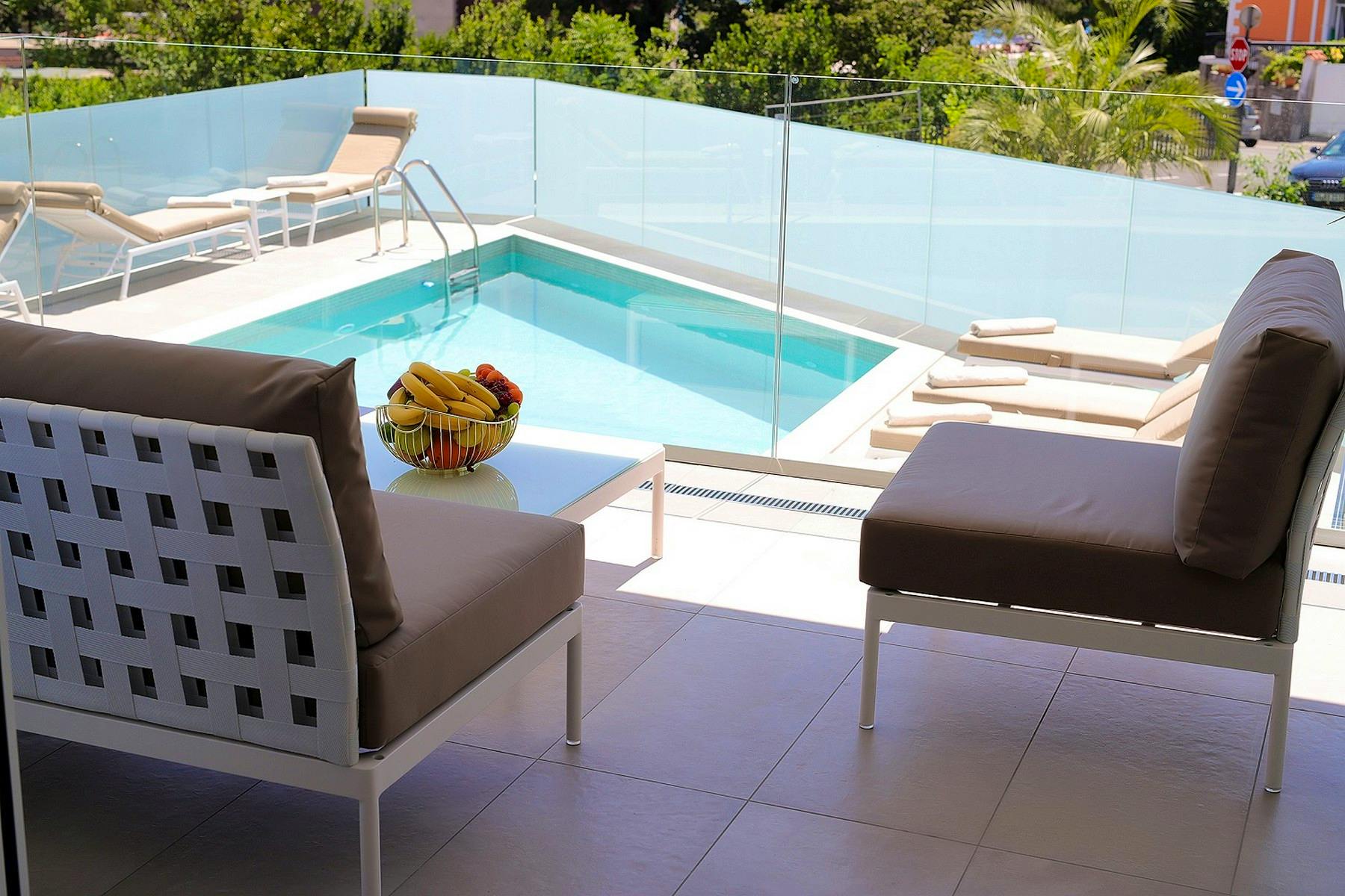 Swimming pool with sundeck and lounge area
