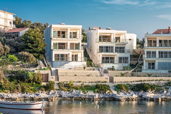 Complex of three seafront villas