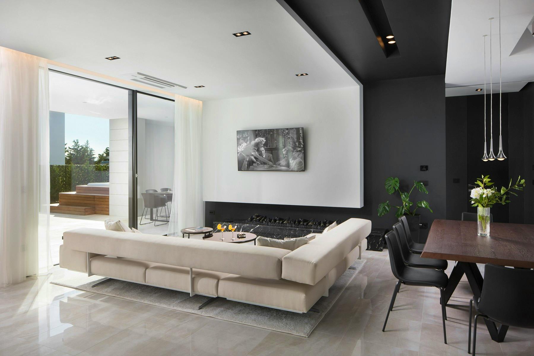 Elegant living room enhanced by contemporary fireplace