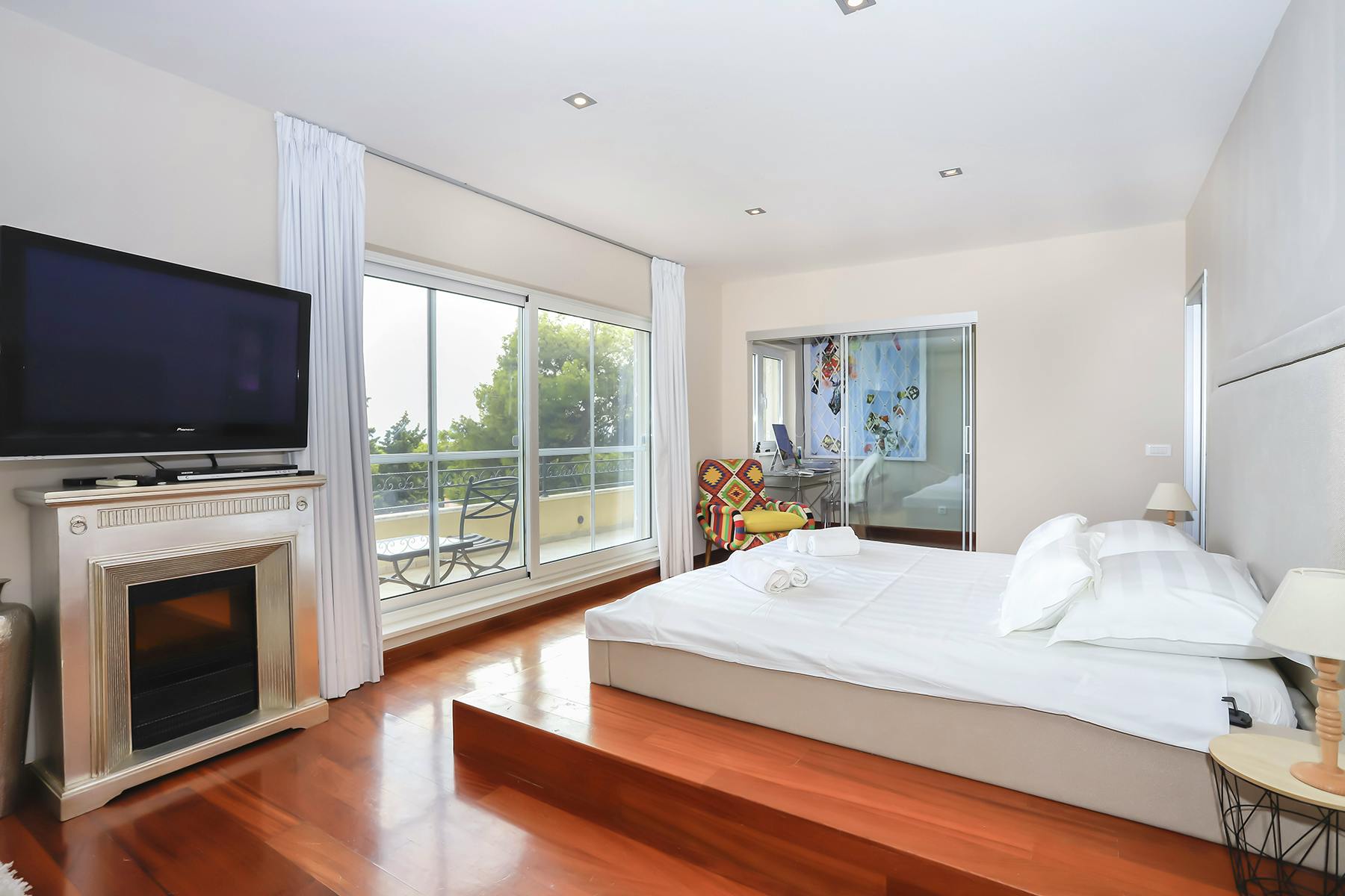 Elegant bedroom with a balcony
