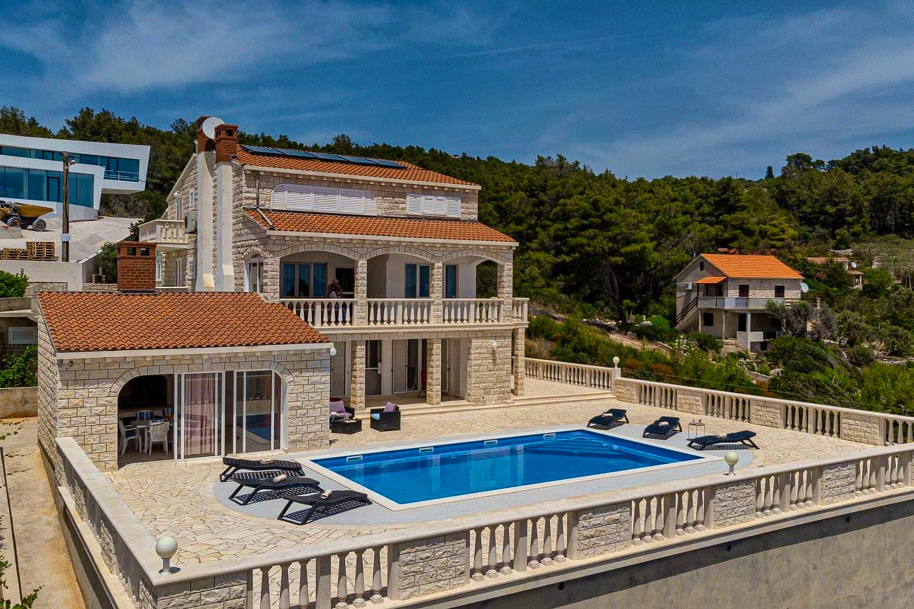 Waterfront stone villa for sale