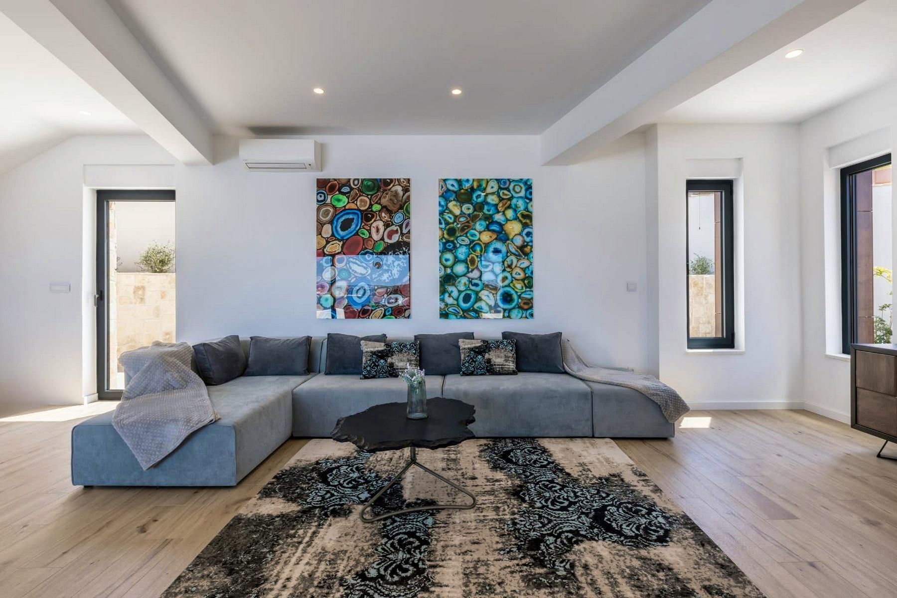 Spacious living area boasting designer furnishing