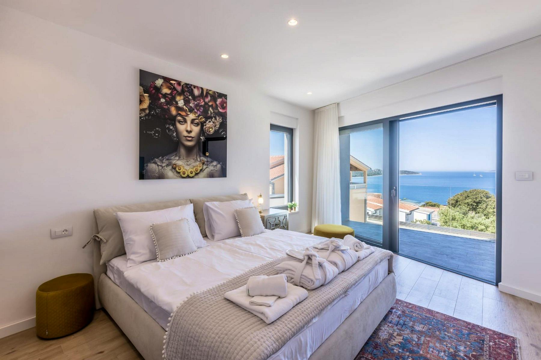 Designer double bedroom overlooking the sea