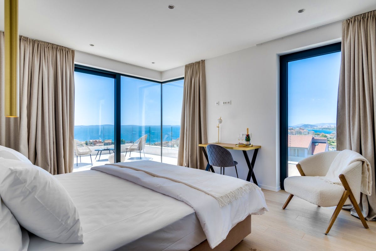 Ensuite double bedroom with open sea view
