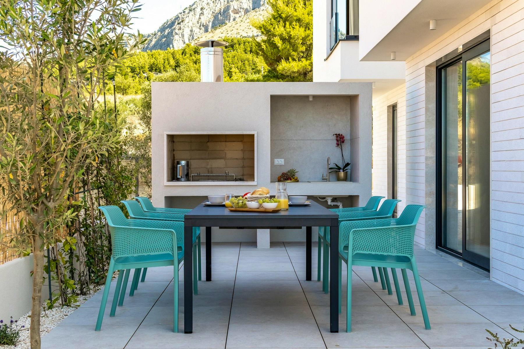 Outdoor kitchen with dining area