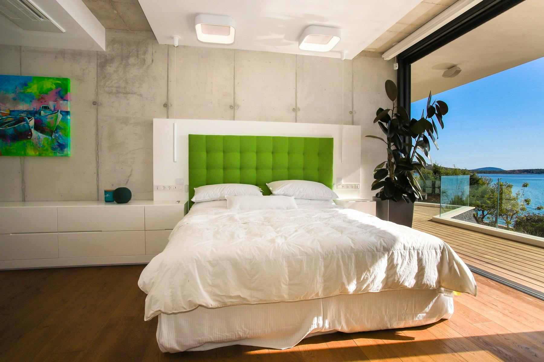 Elegant ensuite bedroom with sea view