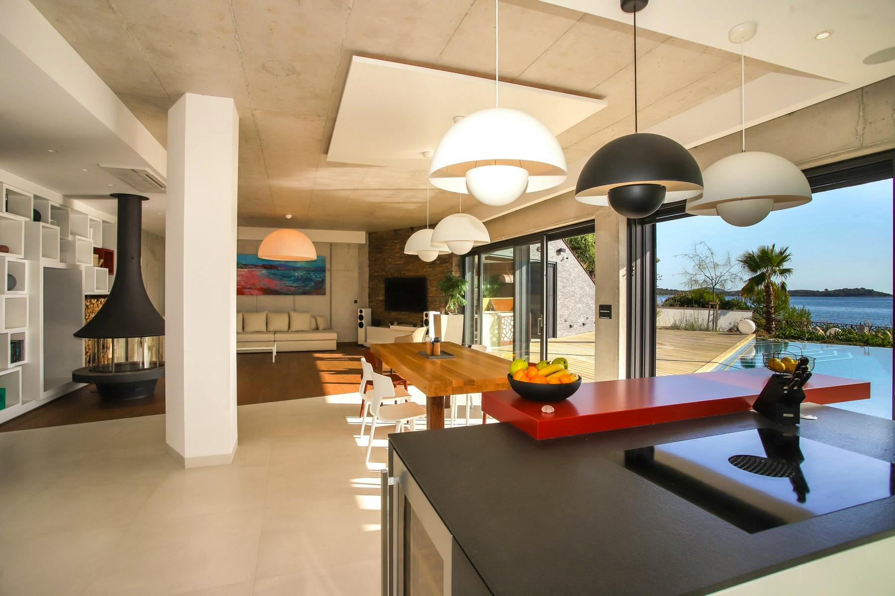 Kitchen, dining room, and living room with spectacular sea view