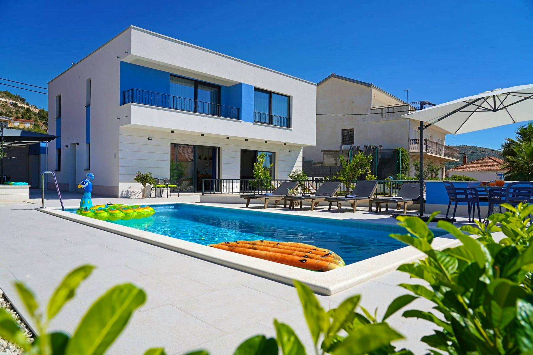 Modern villa with stone elements and swimming pool