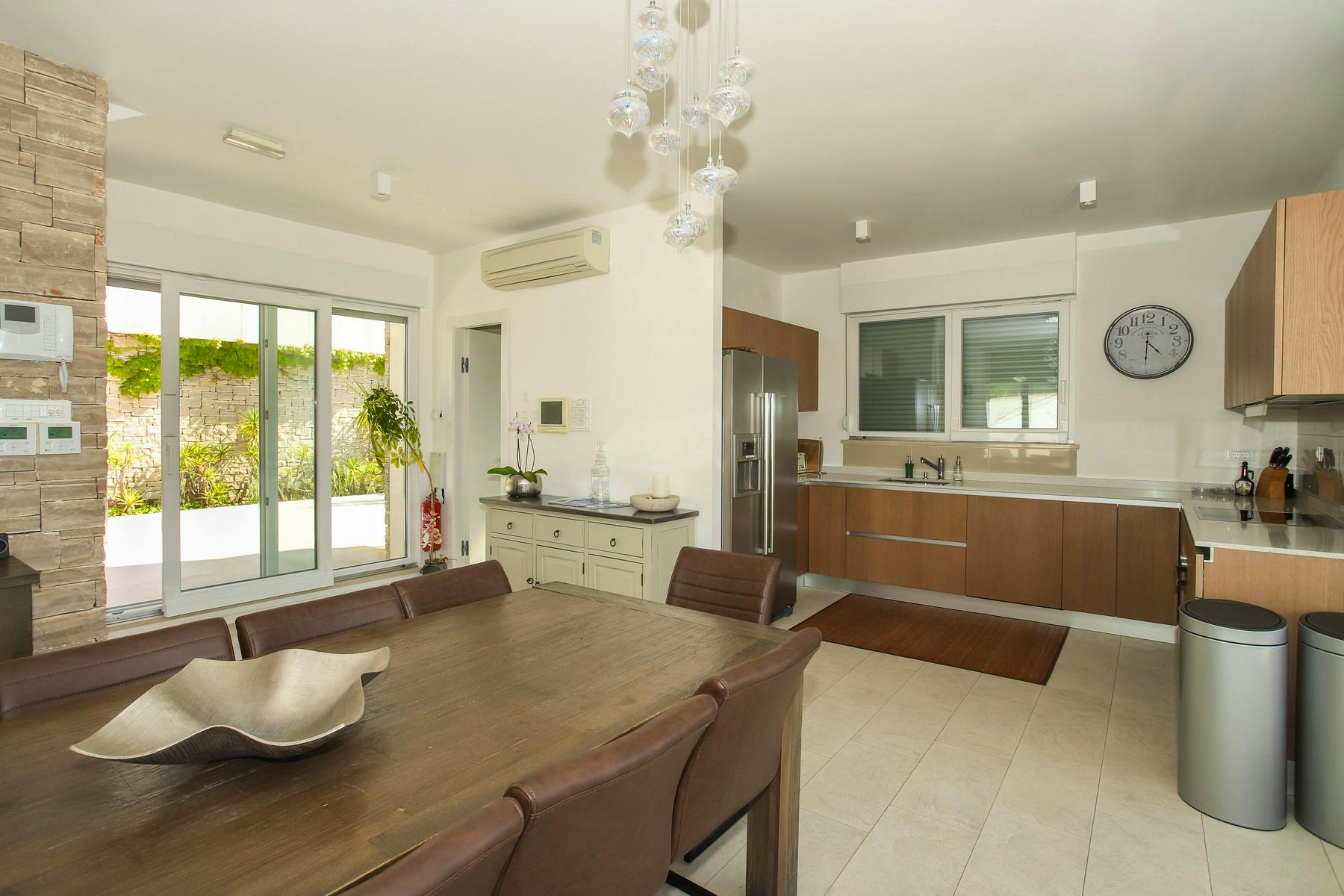 Modern kitchen and dining area with sea view