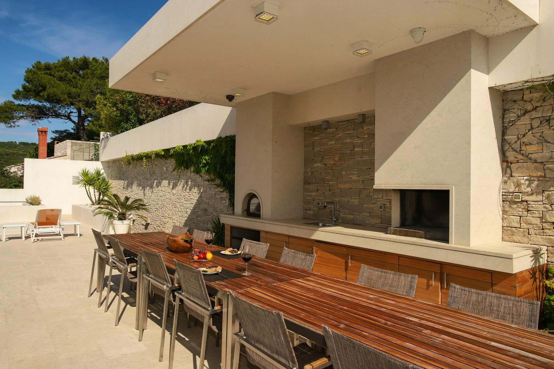 Outside dining area with a grill zone