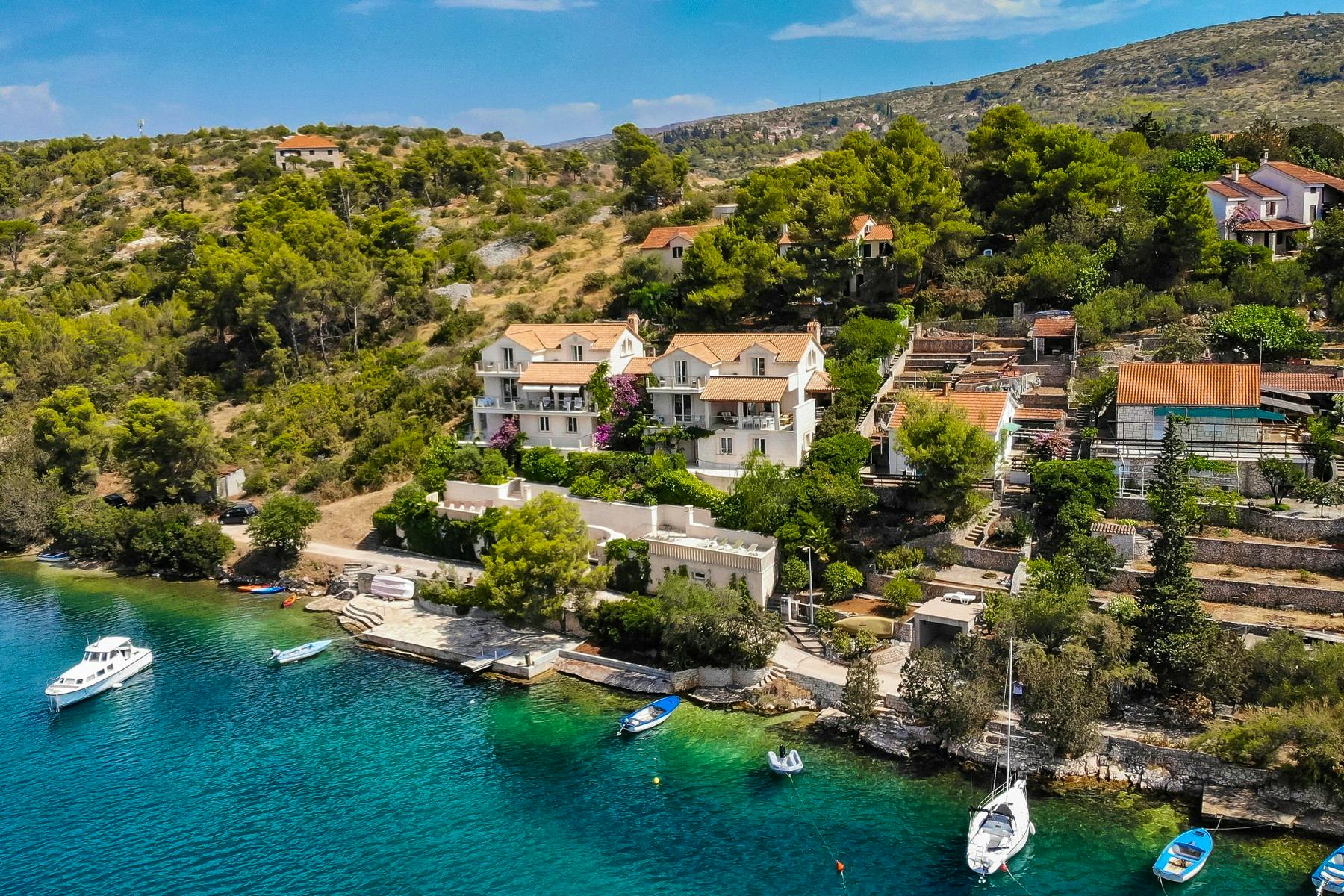 Two seafront stone villas on Brač for sale