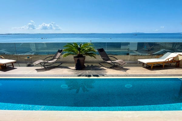 View of the pool and the sea from the balcony