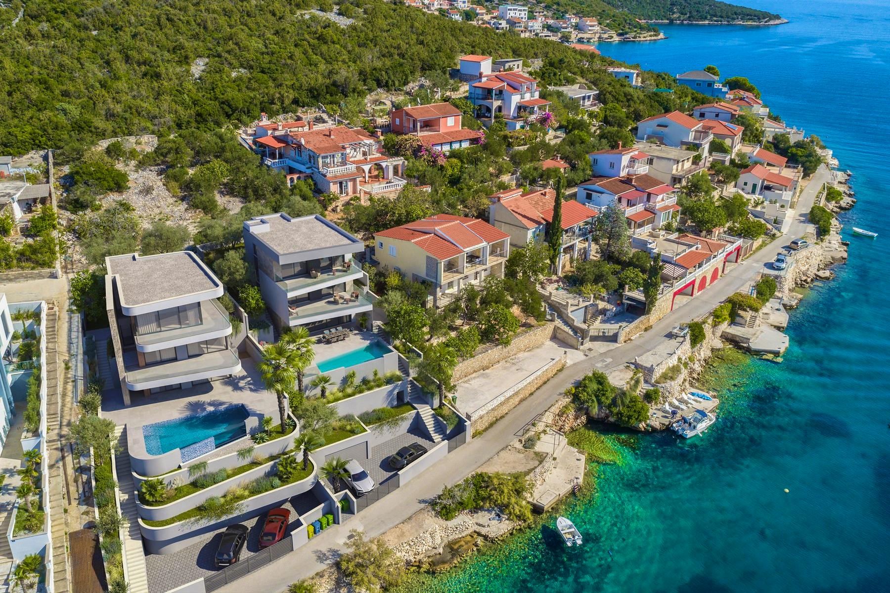 Seafront building land with permit for luxury villa near Trogir