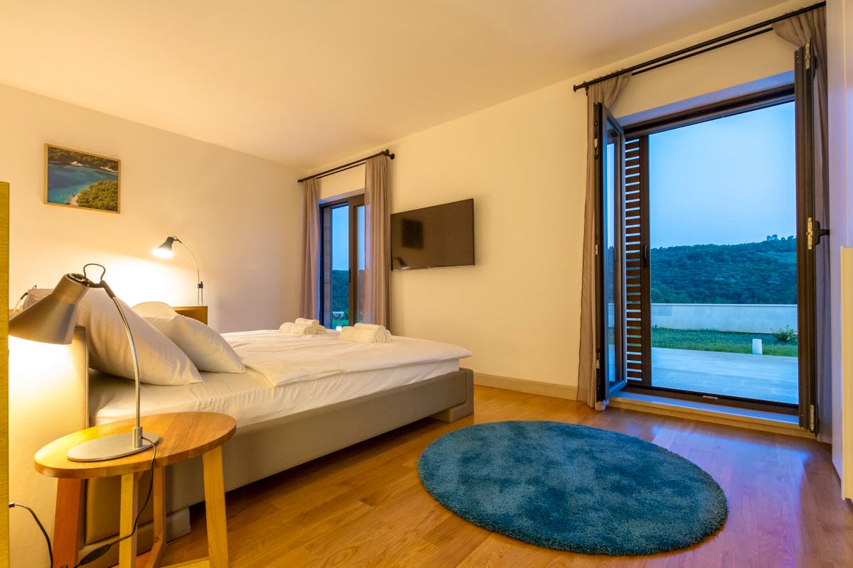 Elegant bedroom overlooking pristine nature