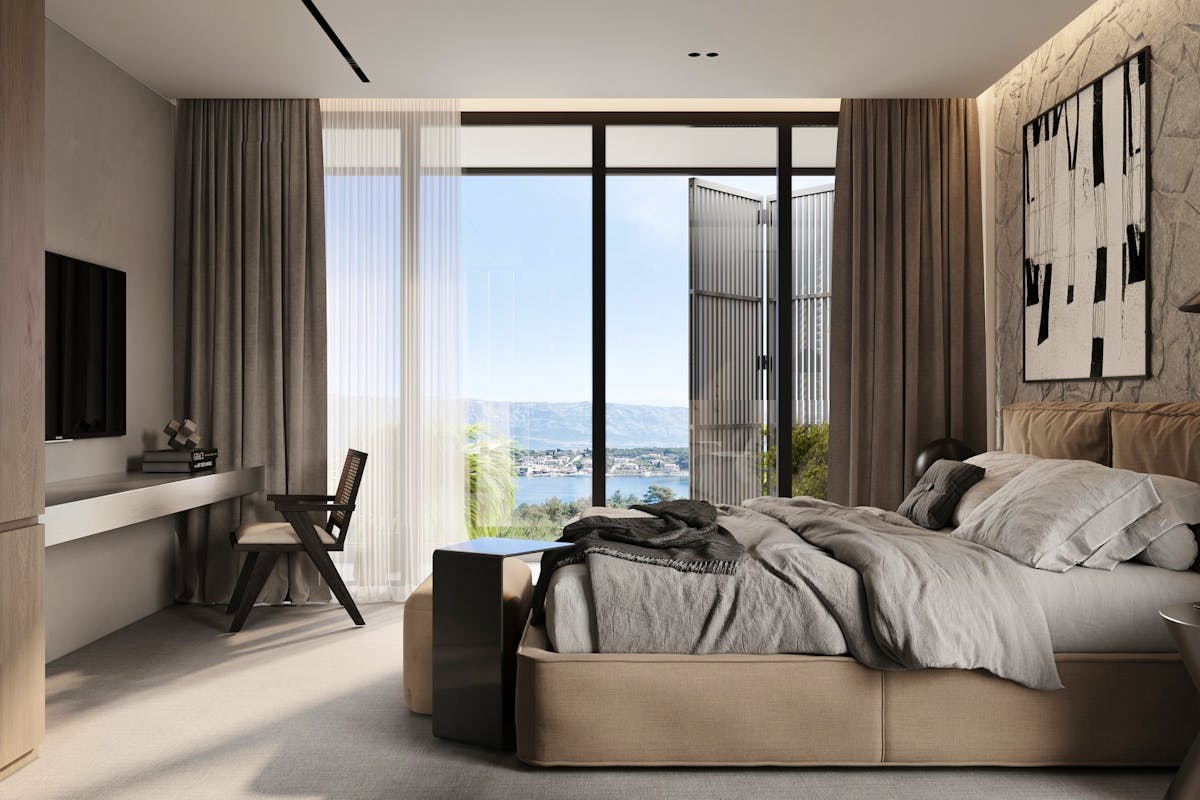 En-suite bedroom with a sea view