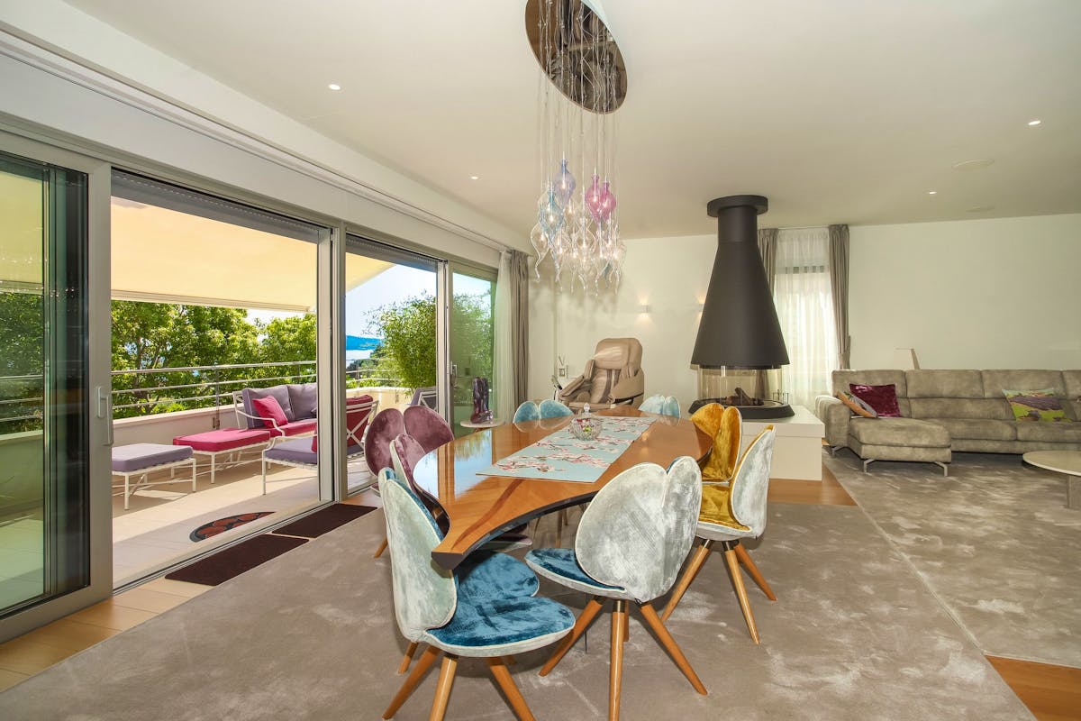Dining area with access to the terrace with sea view