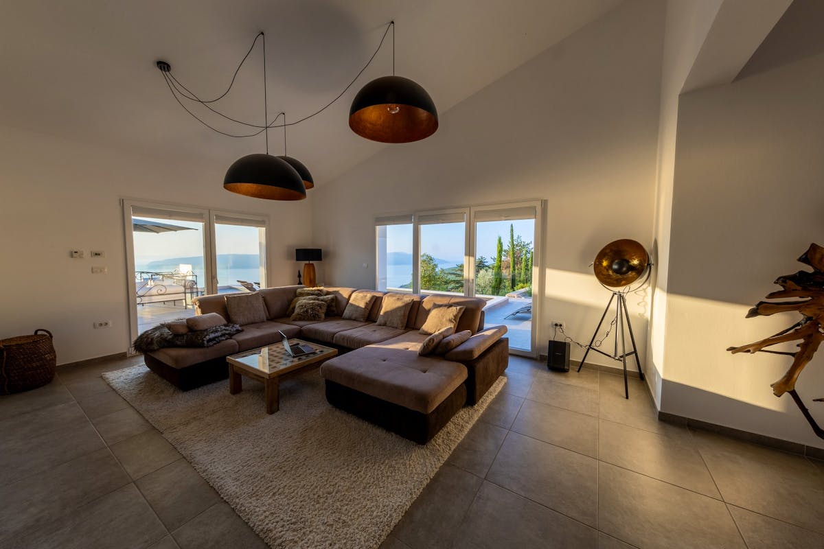 Living room with access to the terrace with open sea view