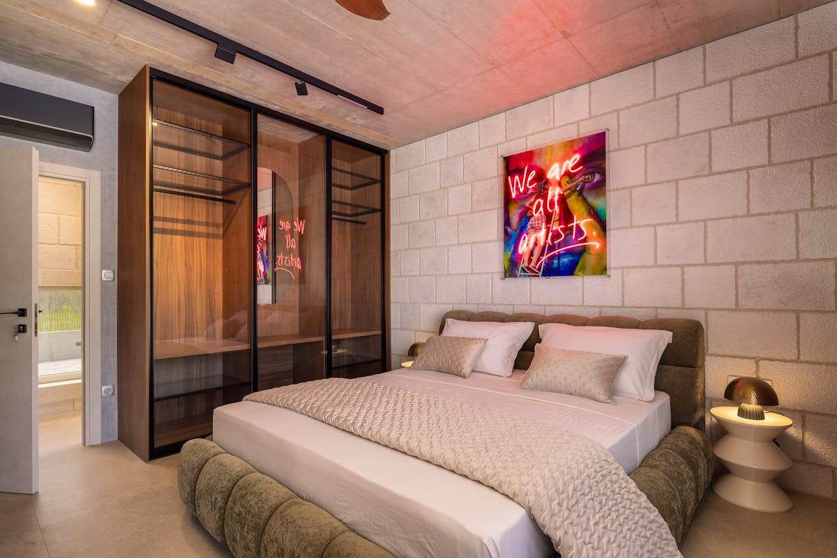 Elegant bedroom with a private bathroom