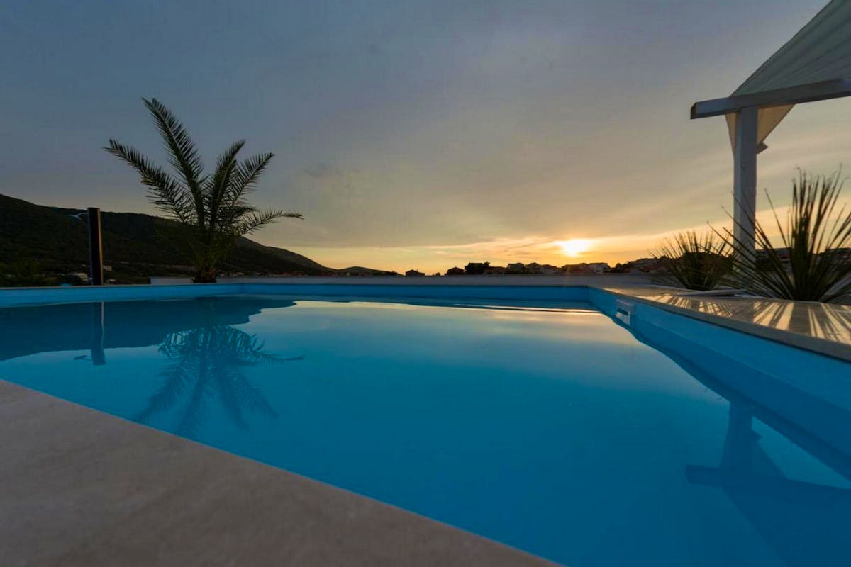 Sunset view from the rooftop terrace with pool