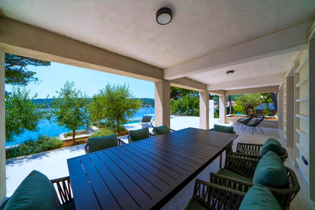 Outdoor dining area overlooking the sea