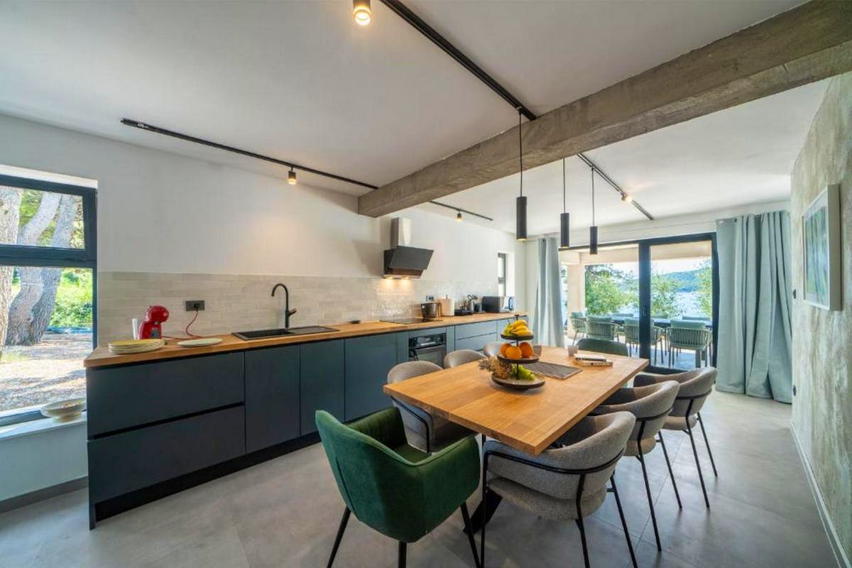 Fully fitted kitchen with dining area