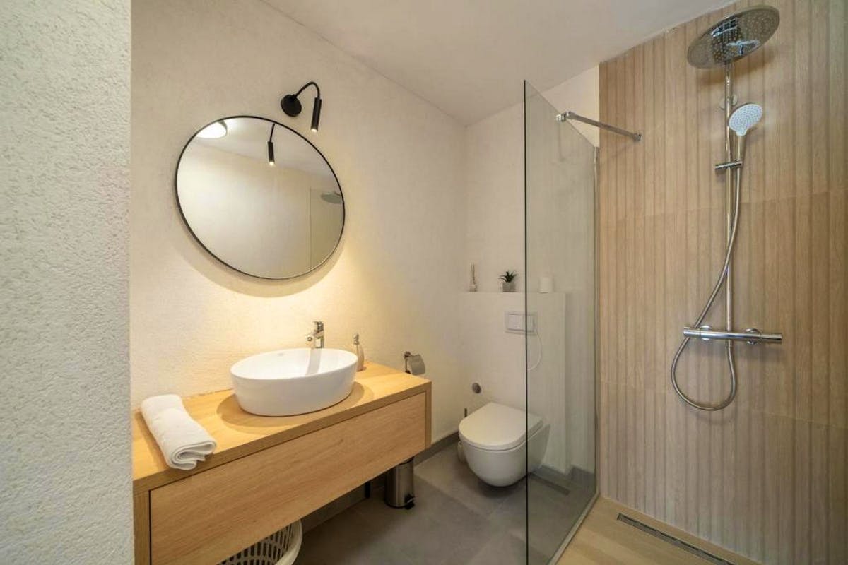 Modern bathroom with walk-in shower