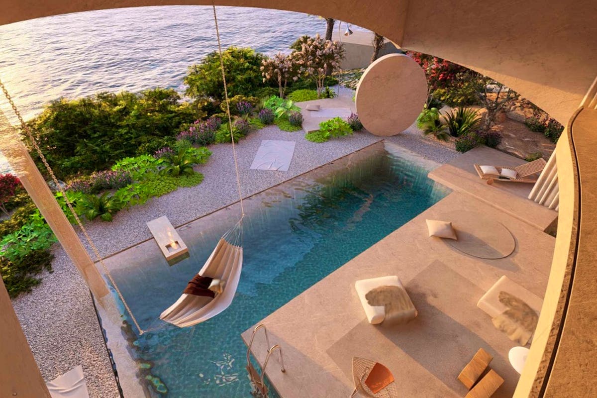 View of the pool and the sea from the top floor