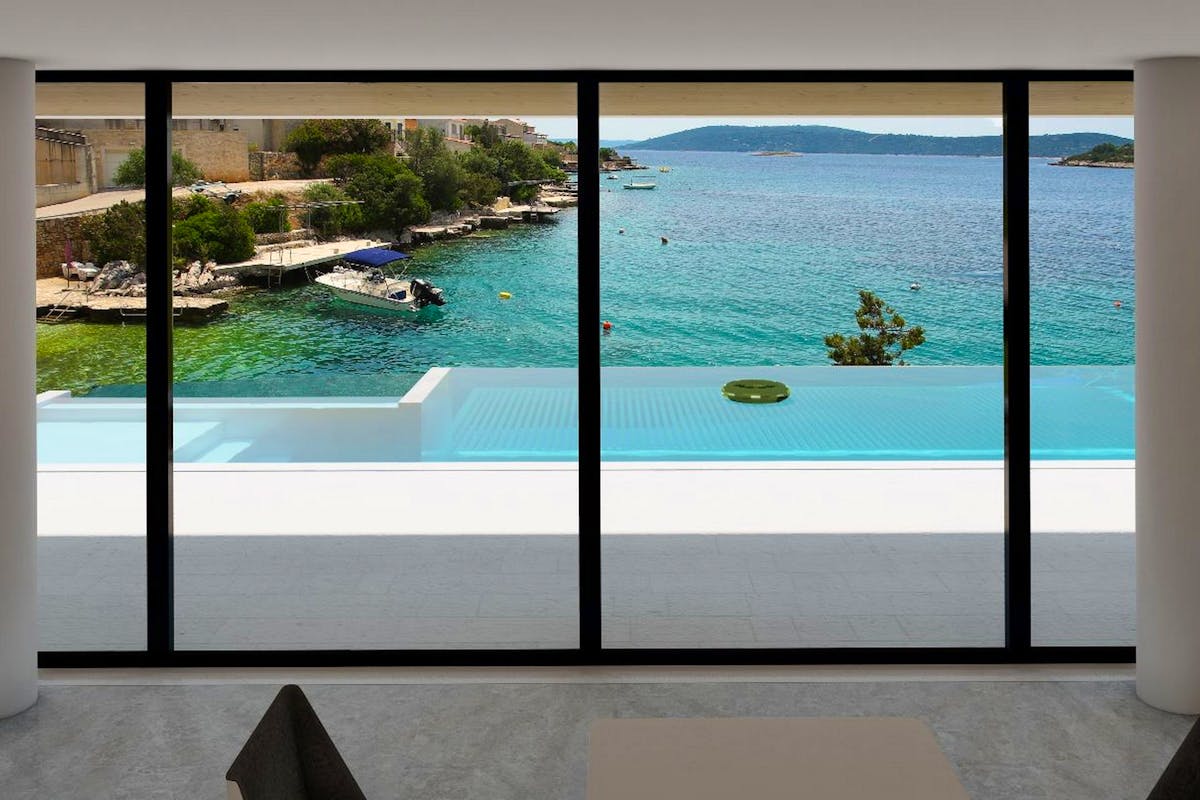 Seafront villa with exquisite view of the pool and the sea for sale