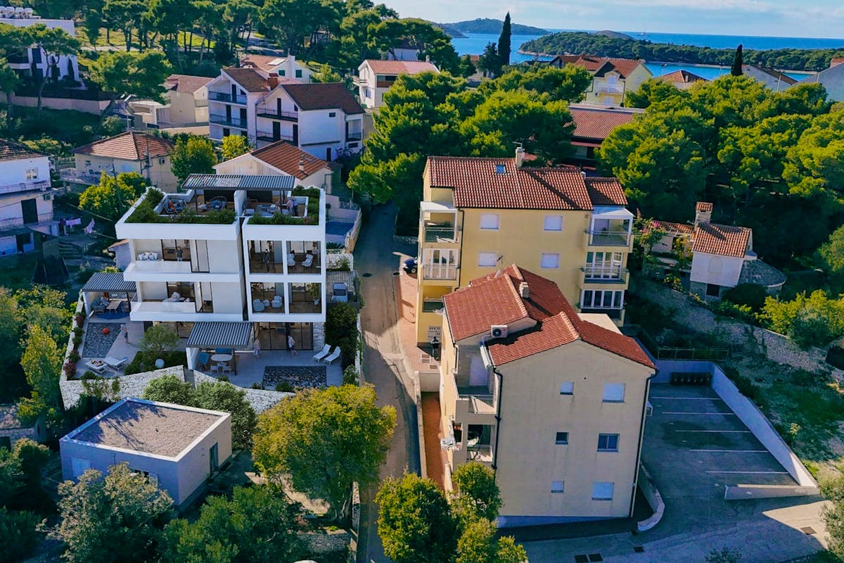 Project of a modern villa with 2 units by the sea in Rogoznica for sale