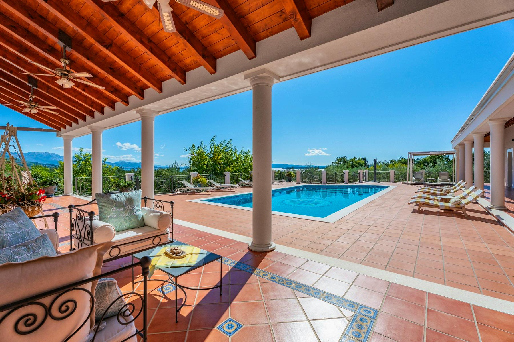 Spacious terrace with swimming pool and sundeck