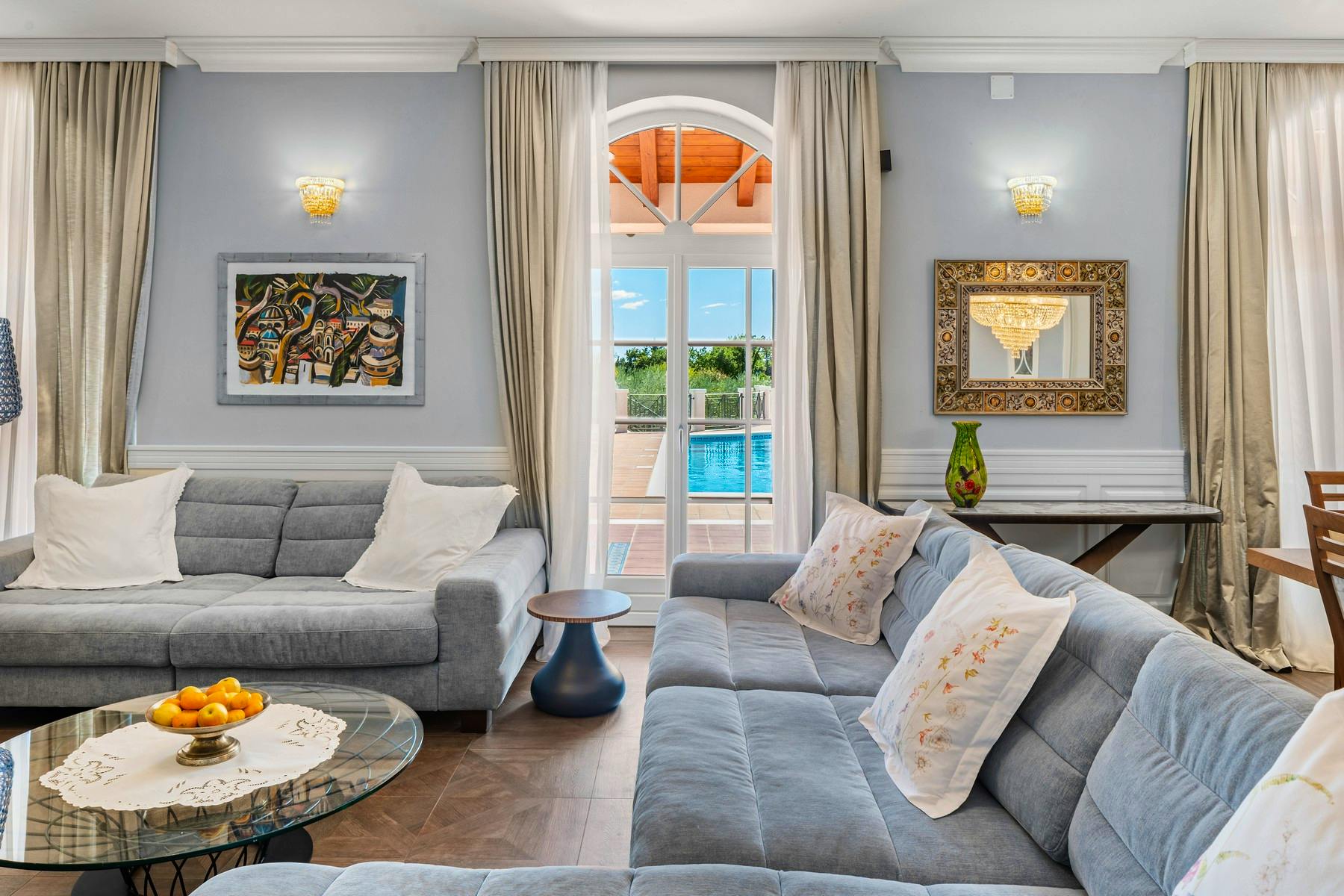 Stylish living room with access to the terrace with a swimming pool