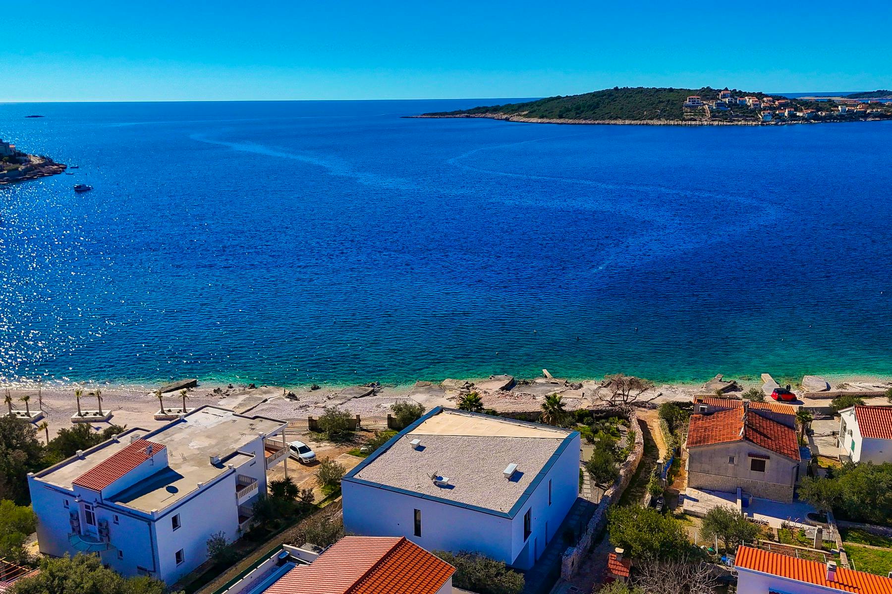 Newly built seafront villa with open sea view