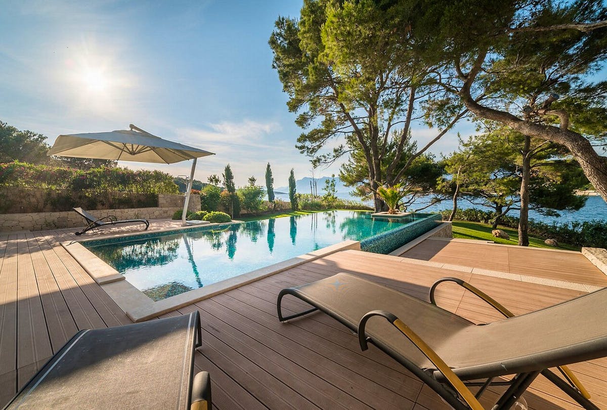 Spacious heated swimming pool overlooking the sea