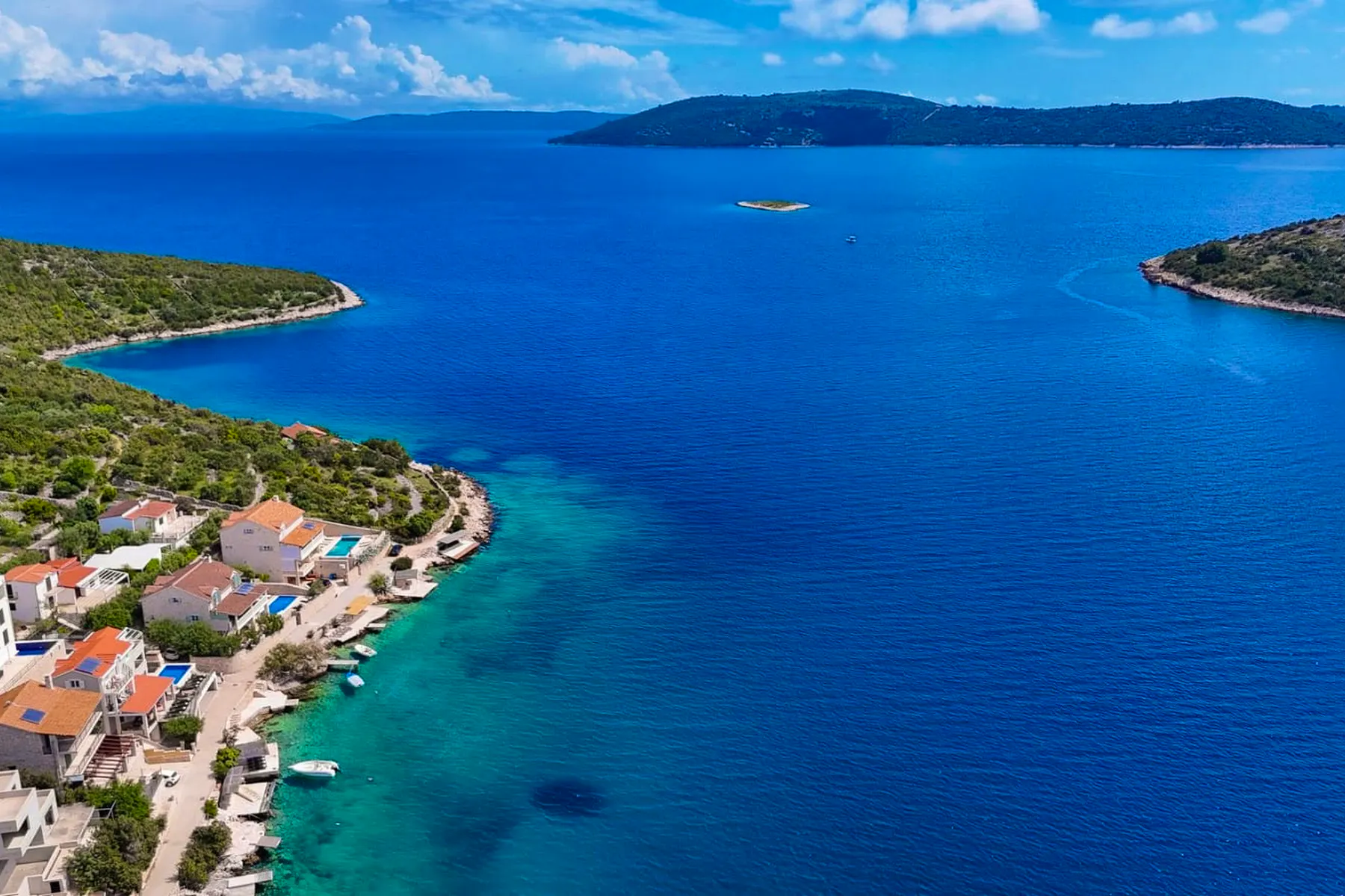 Seafront stone villa with open sea view near Trogir for sale