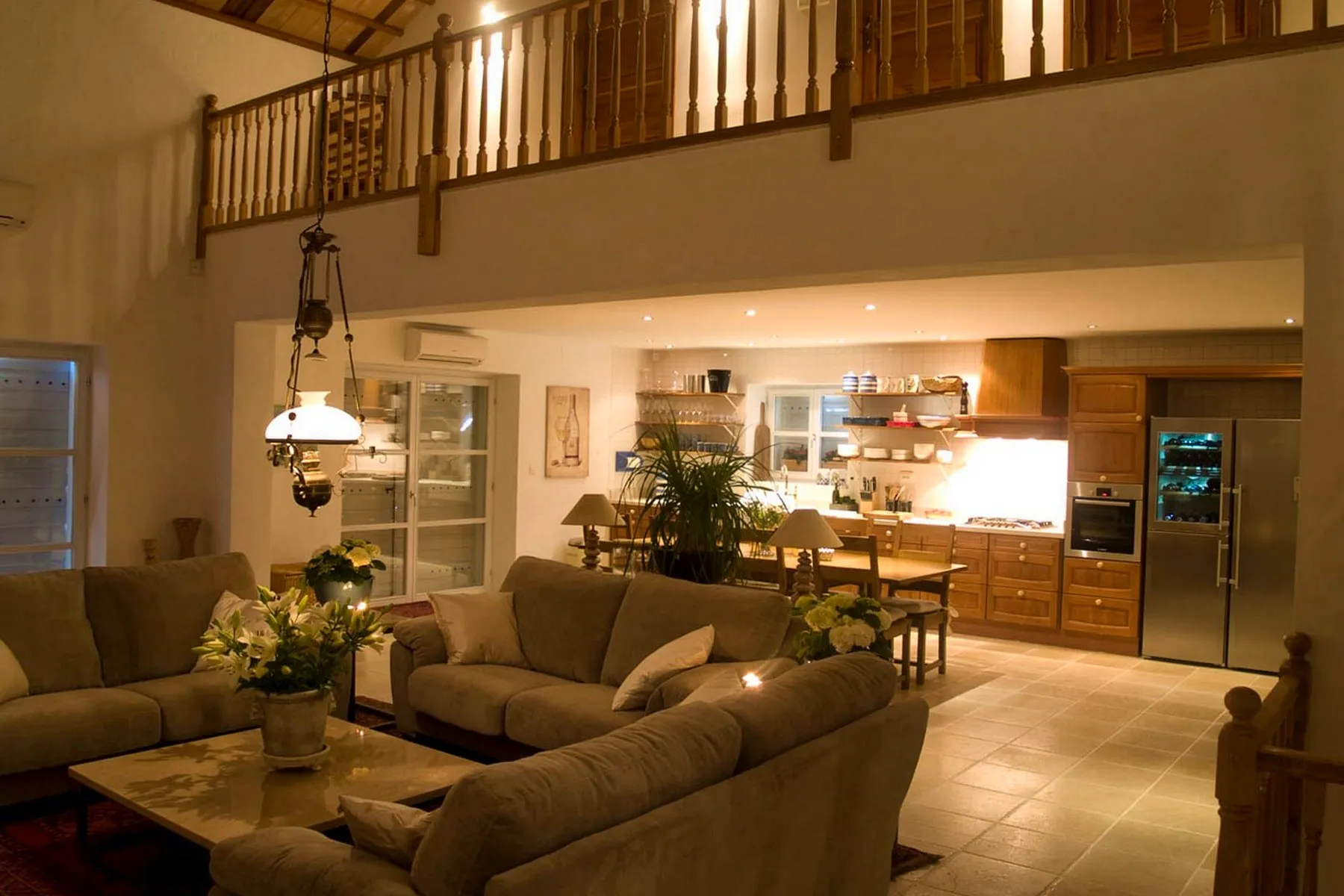 Open-concept living area with kitchen, dining room, and kitchen